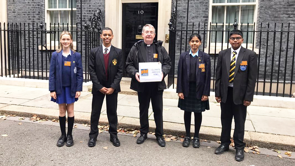 Schoolchildren and Provincial deliver Jesuit Missions’ climate petition to Downing Street